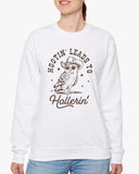 Woman wearing white 'Hootin Leads To Hollerin' sweatshirt with funny retro owl graphic