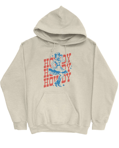Flat lay of a sand beige hoodie with a retro howdy cowgirl graphic.