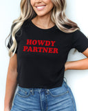 Woman wearing a black 'Howdy Partner' crop top.