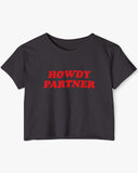 Flat lay black 'Howdy Partner' crop top.