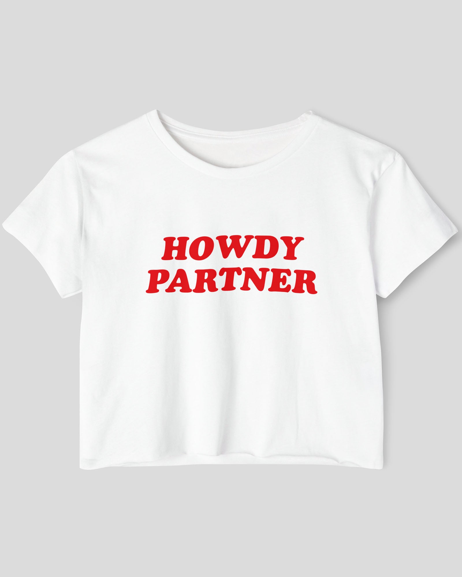 Flat lay white 'Howdy Partner' crop top.