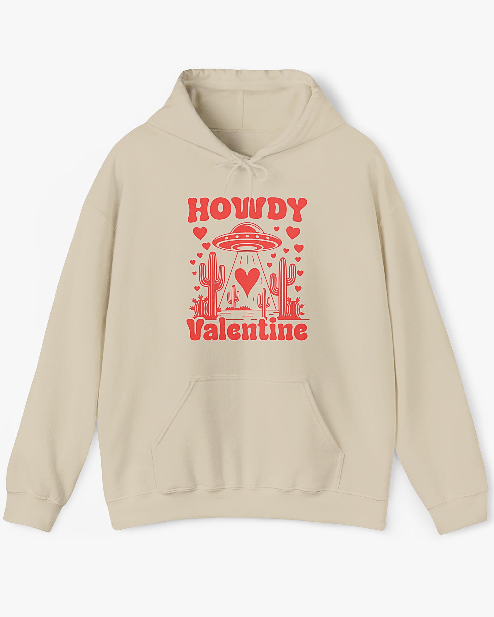Flat lay sand beige Howdy Valentine hoodie featuring a retro western desert scene with a UFO and floating hearts graphic.