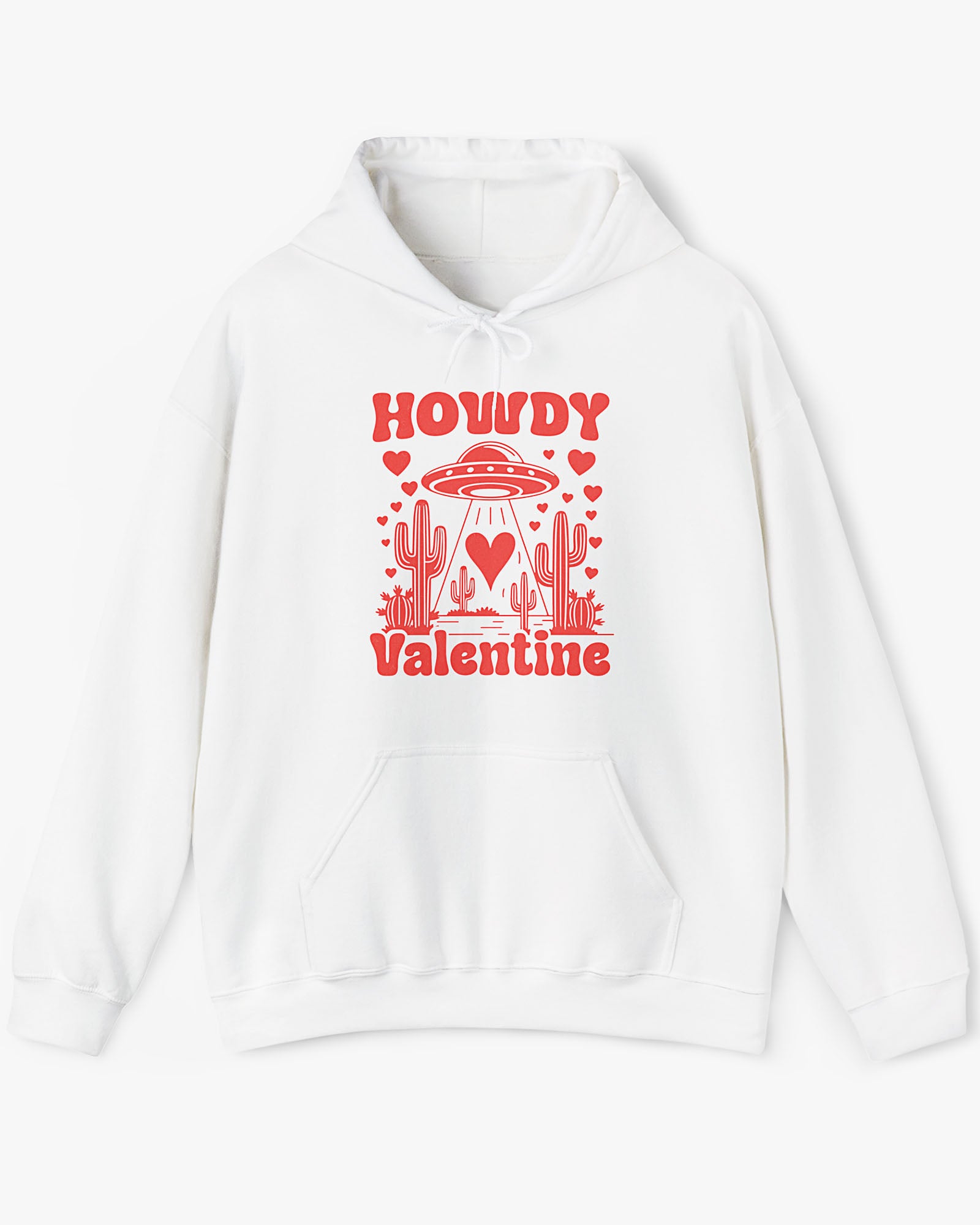 Flat lay white Howdy Valentine hoodie featuring a retro western desert scene with a UFO and floating hearts graphic.