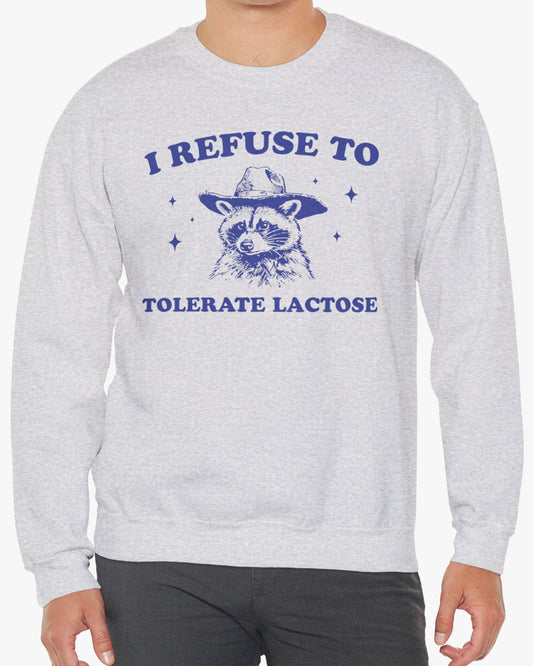 Man wearing an 'I Refuse To Tolerate Lactose' sweatshirt in ash gray, featuring a retro western graphic design and unisex fit.