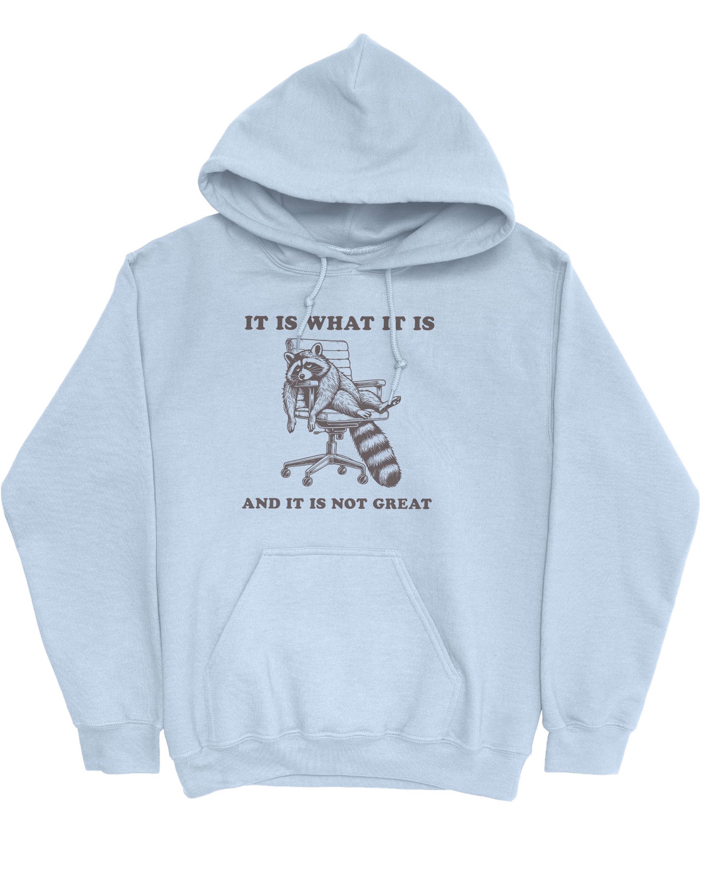 Flat lay of a light blue 'It Is What It Is And It Is Not Great' hoodie with a funny retro graphic of an exhausted raccoon sitting on a chair.