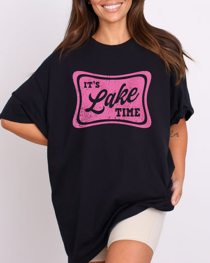 Model wearing black color shirt with 'It's Lake Time' graphic design
