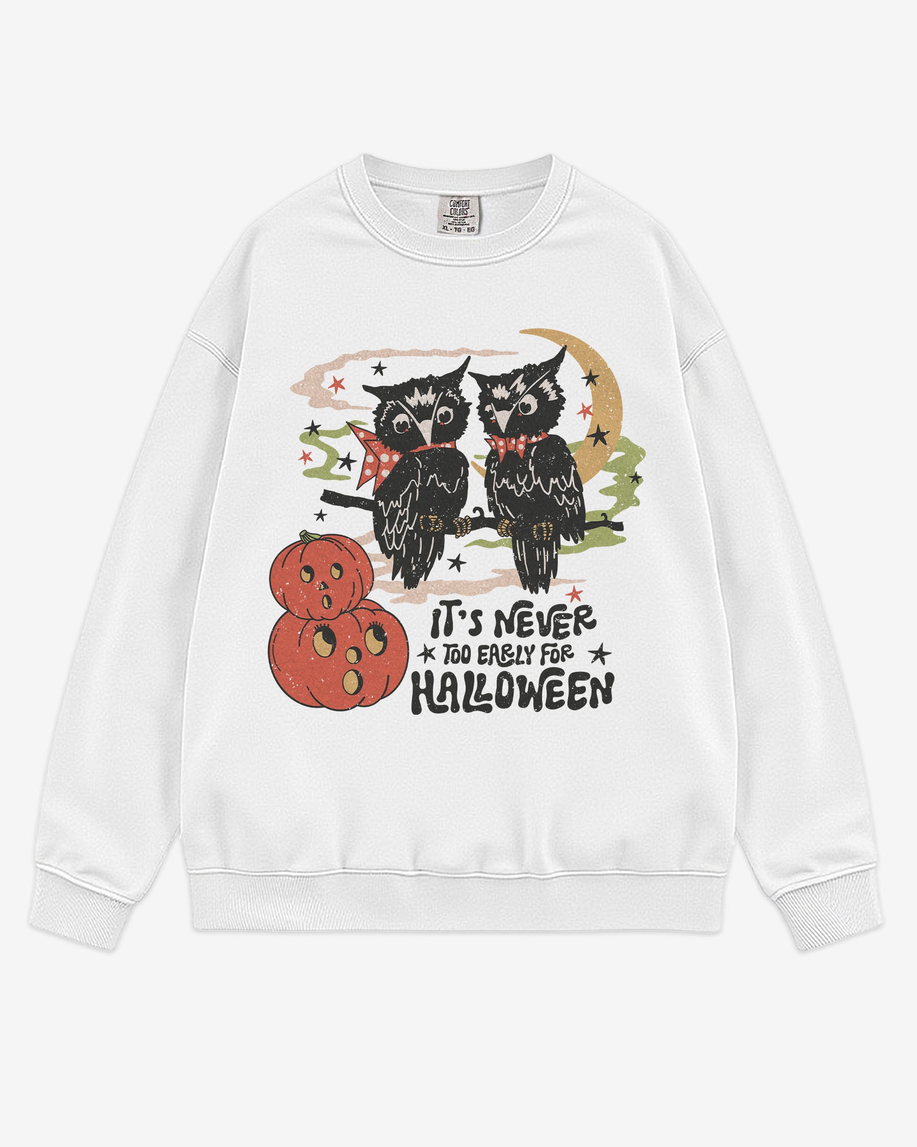 Flat lay white ‘It’s Never Too Early For Halloween’ sweatshirt with retro graphic of two owls, pumpkins, and night sky.