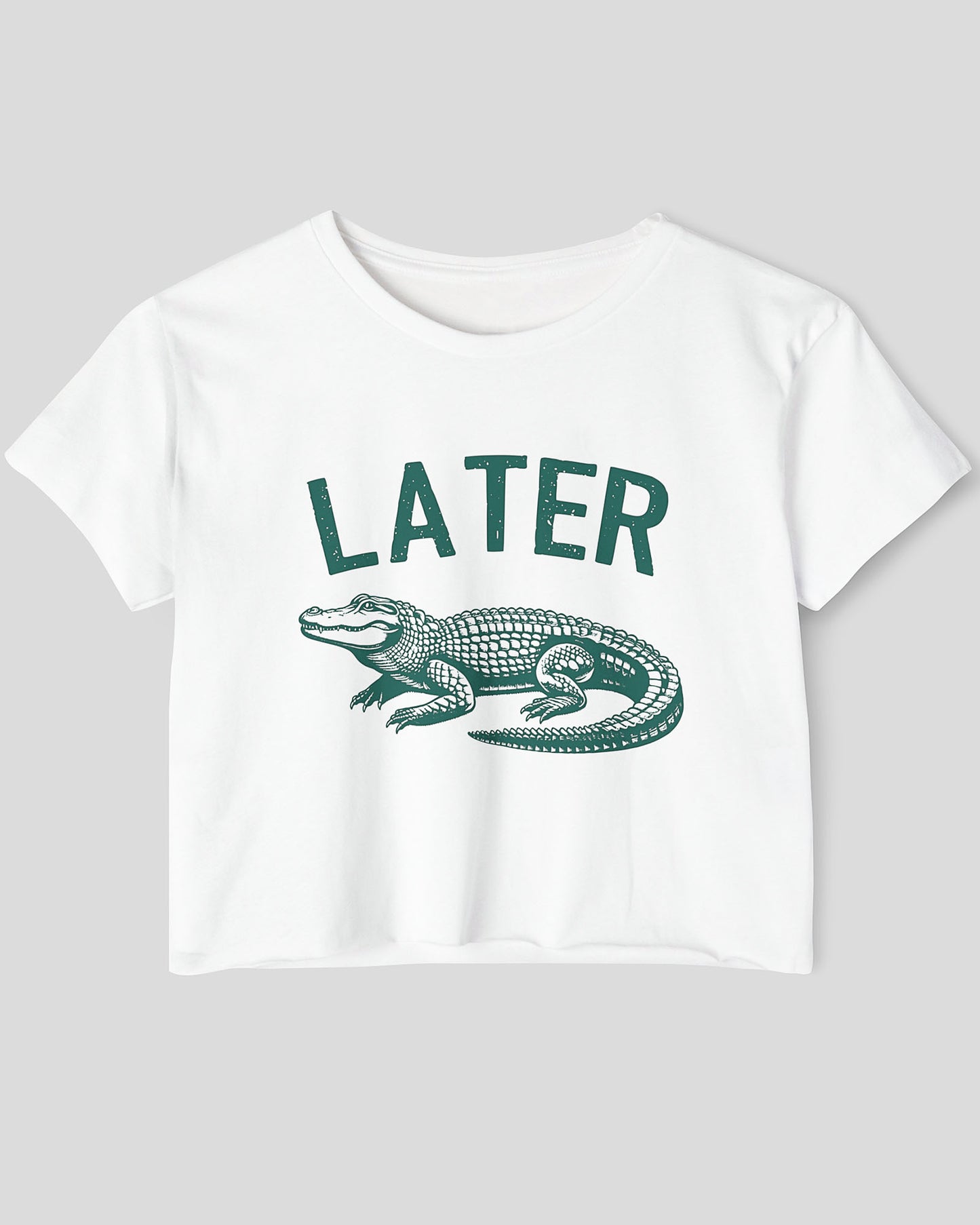 Flat lay white-colored 'Later Gator' crop top featuring a funny retro alligator graphic.