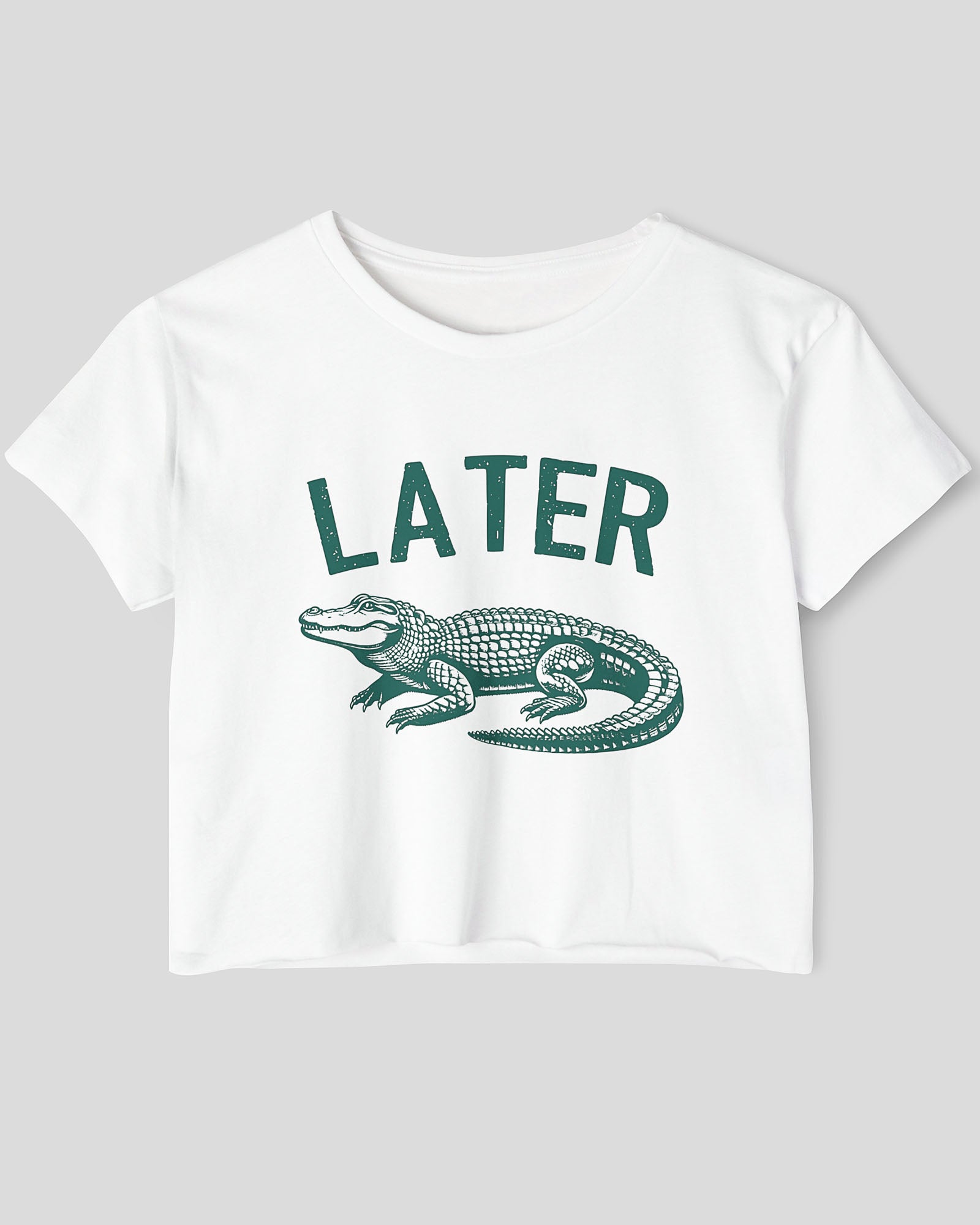 Flat lay white-colored 'Later Gator' crop top featuring a funny retro alligator graphic.