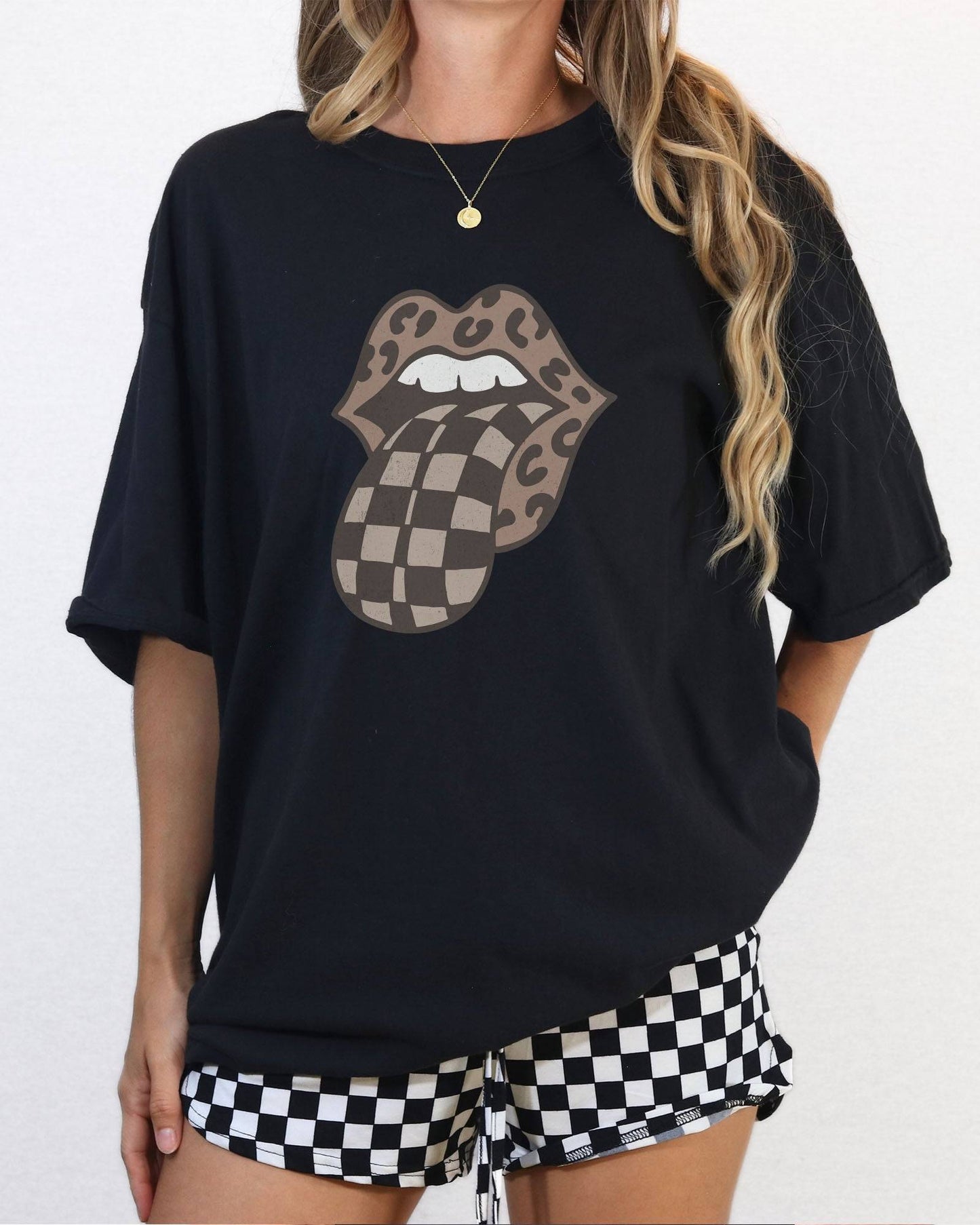 Model wearing black color shirt with 'Leopard Mouth Checkered Tongue' graphic design