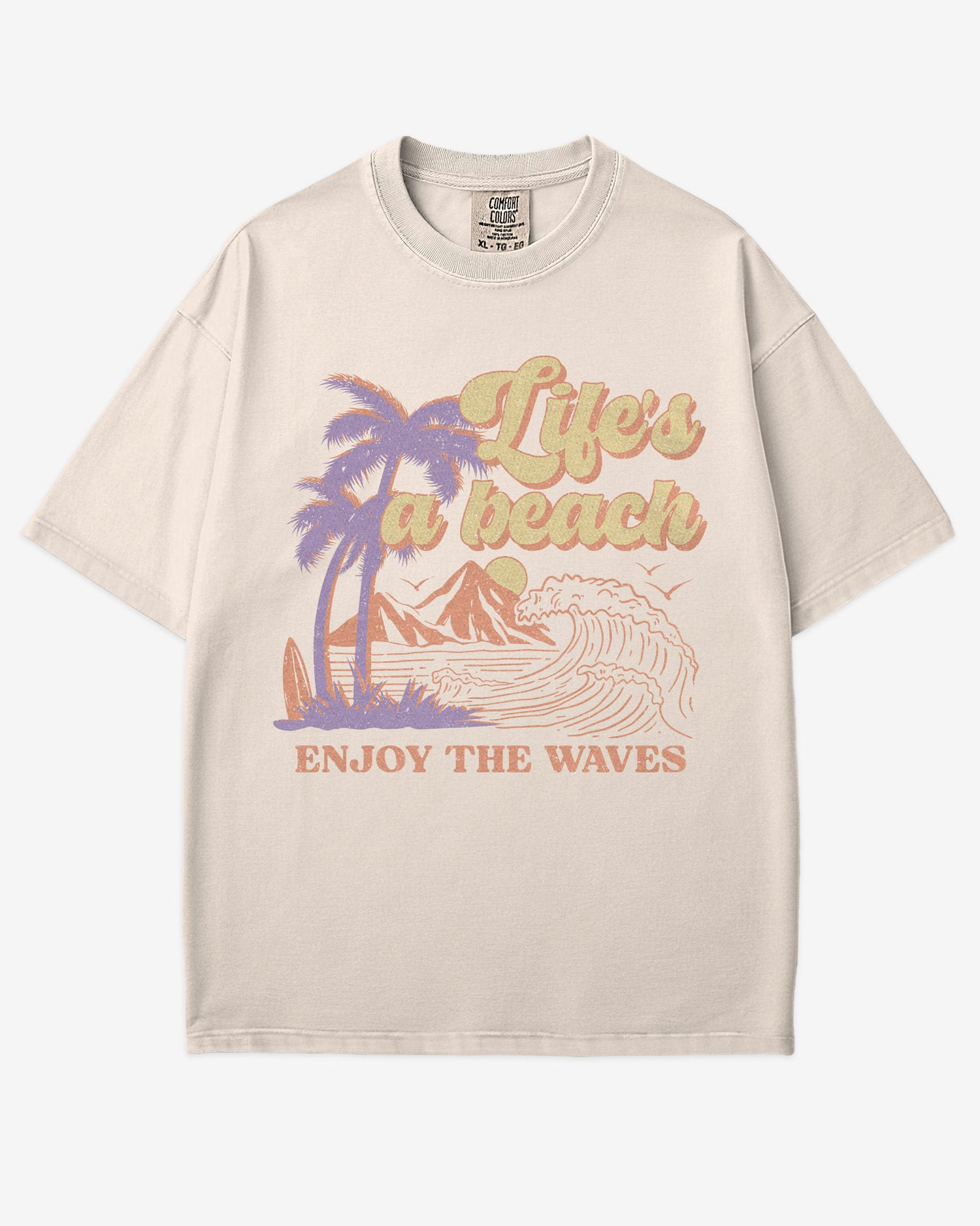 Life’s A Beach – Enjoy The Waves retro surf graphic t-shirt in ivory with beach and waves design.