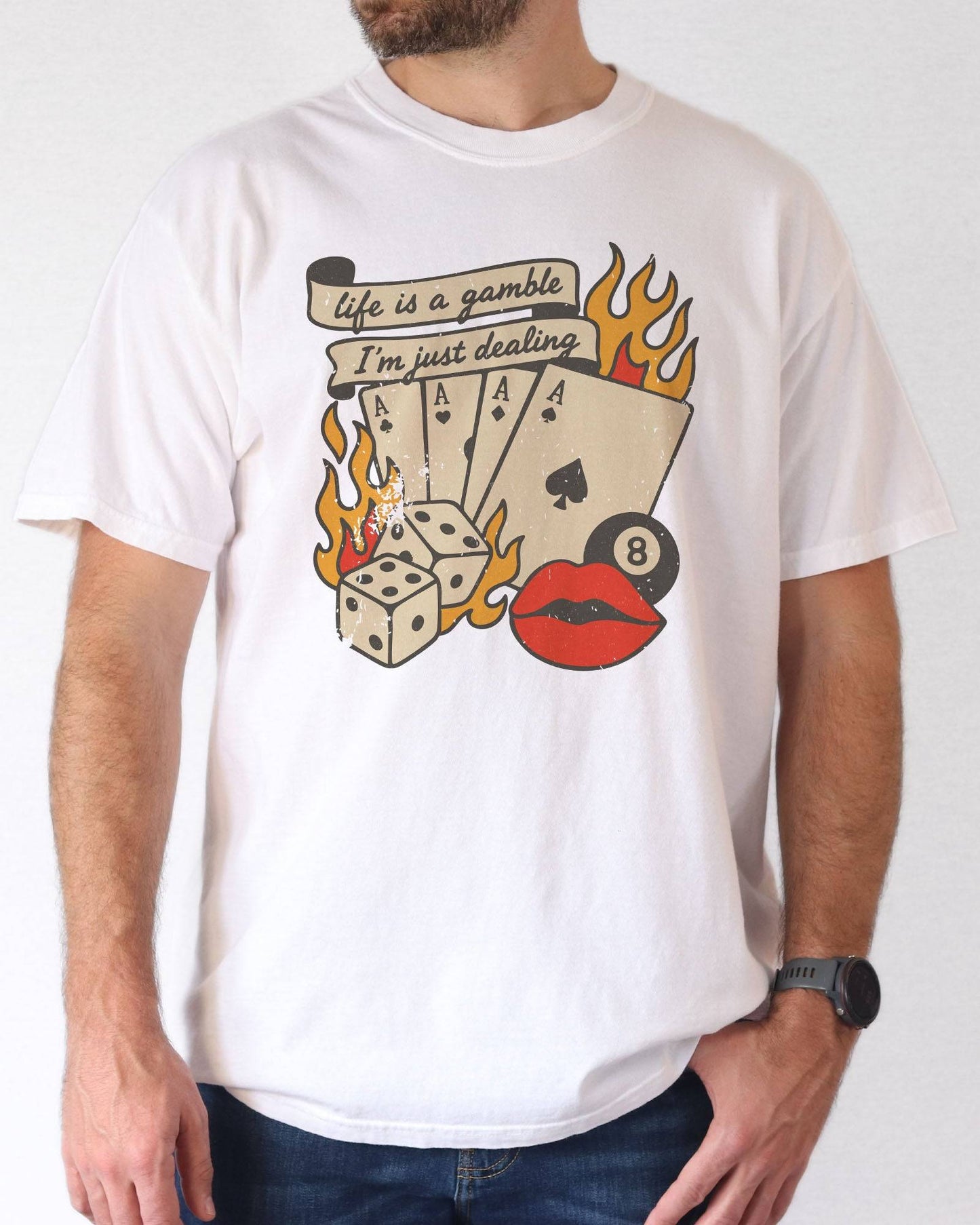 Man wearing white color shirt with 'Life Is A Gamble, I'm Just Dealing' retro poker and gambling graphic design