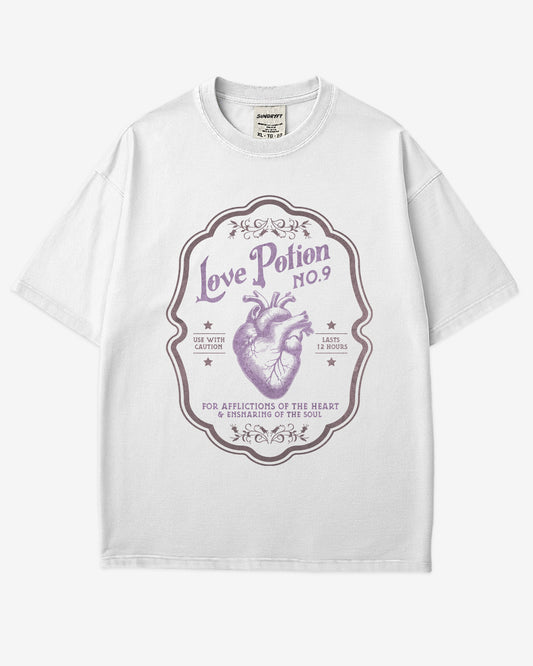 Love Potion Halloween Shirt in white color with retro potion label and heart graphic design