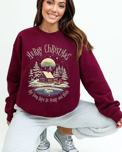 Model wearing maroon color sweatshirt with 'May Your Days Be Merry And Bright' Christmas graphic design