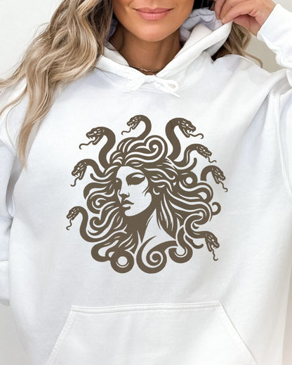 Close-up of white hoodie featuring a vintage-style Medusa graphic with snake hair.