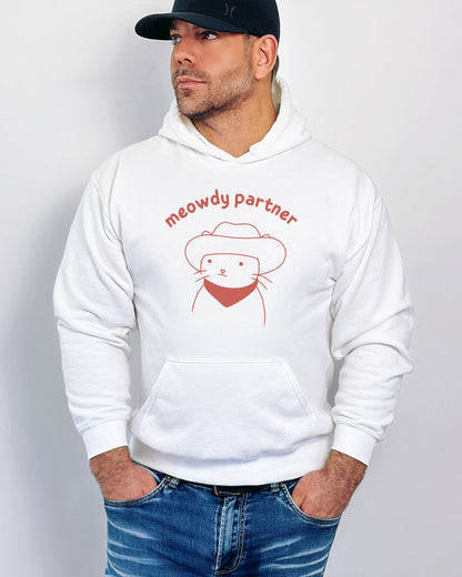 Man wearing a white hoodie featuring a funny retro cowboy cat line-art graphic with the quote 'Meowdy Partner'.