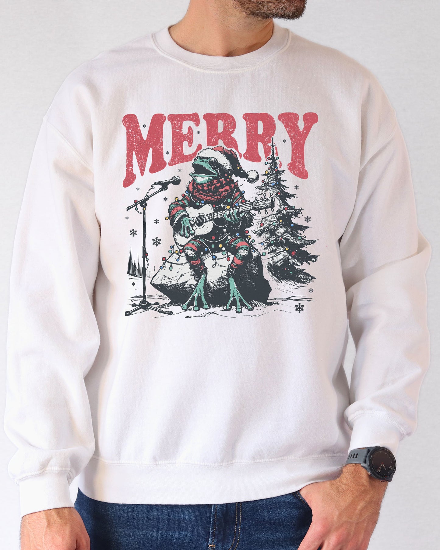 Model wearing white color sweatshirt with 'Merry Frog' graphic design