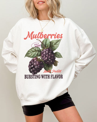 Model wearing white color sweatshirt with mulberries fruit graphic design