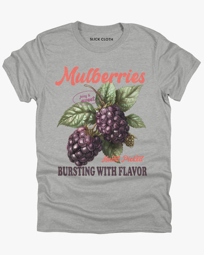 Flat lay of a sport gray  t-shirt featuring a retro fruit graphic with the quote 'Mulberries - Bursting With Flavor.'