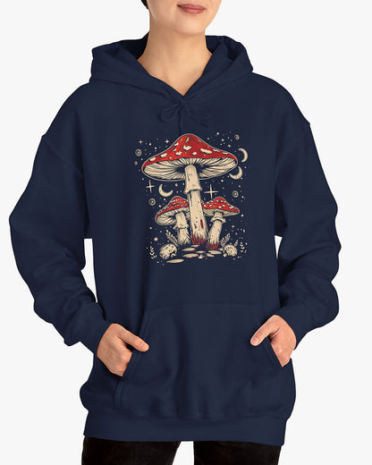 Woman wearing a navy blue hoodie featuring a retro mushroom graphic with a starry night sky background.
