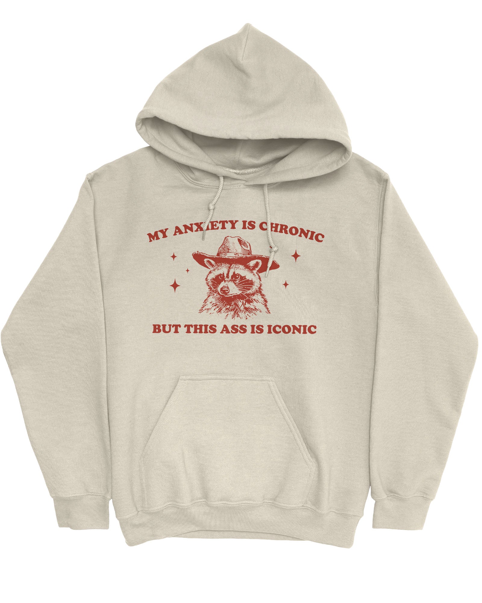Flat lay of a sand beige 'My Anxiety Is Chronic But This Ass Is Iconic' hoodie featuring a funny retro cowboy raccoon graphic.