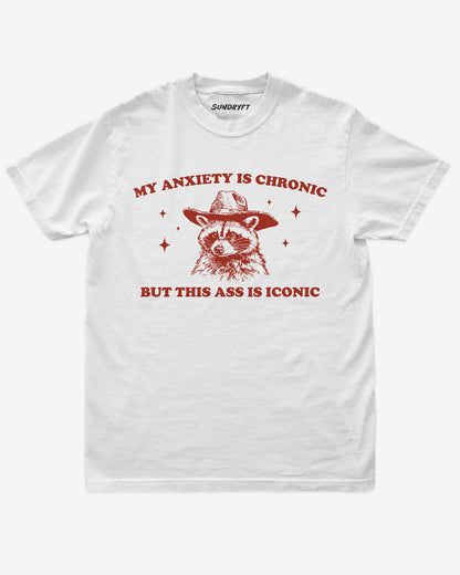 My Anxiety Is Chronic But This Ass Is Iconic shirt in white with funny cowboy raccoon graphic