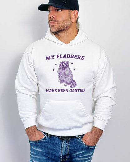Man wearing a white 'My Flabbers Have Been Gasted' hoodie featuring a funny retro raccoon freaking out graphic.