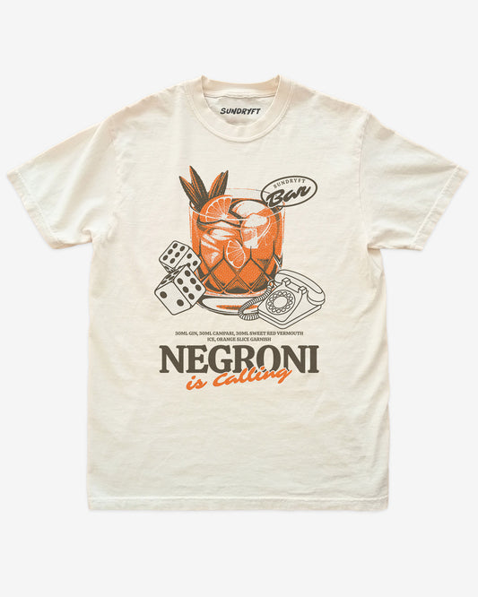 Negroni Is Calling shirt in ivory with retro graphic of negroni drink and telephone