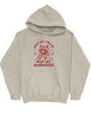 Flat lay a sand beige 'Not My Trash, Not My Dumpster' hoodie with a funny retro raccoon drinking coffee graphic.