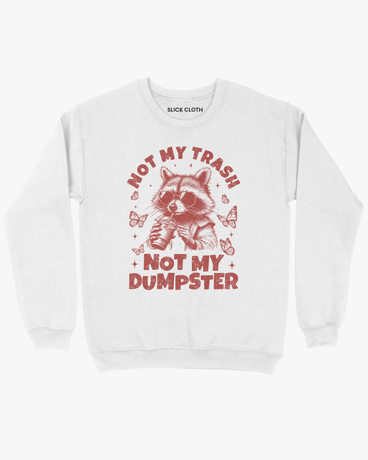 Flat lay of a white 'Not My Trash Not My Dumpster' sweatshirt with a funny retro raccoon drinking coffee graphic.