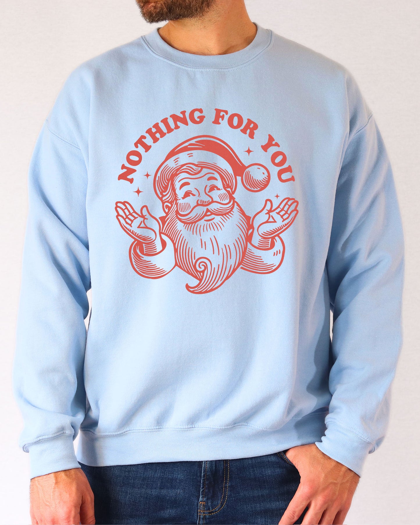 Model wearing light blue color sweatshirt with 'Nothing For You' Santa Claus graphic design