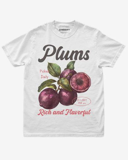 Flat lay of white Plums Fruit Shirt, retro 90s vintage fruit graphic tee with rich and flavorful plum design