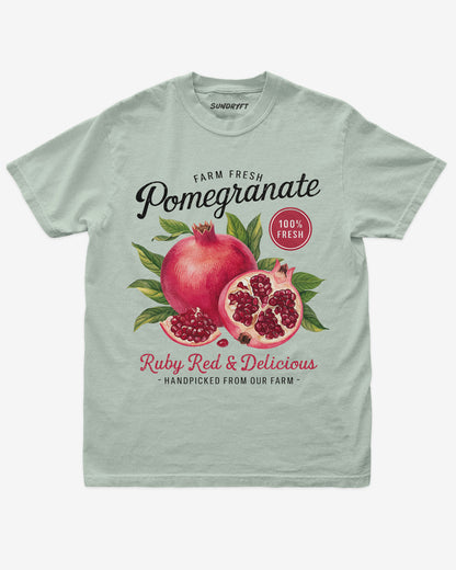 Pomegranate Fruit Shirt flat lay in bay color – retro 90s vintage fruit graphic tee with relaxed unisex fit, soft cotton, and ruby-red pomegranate label design.
