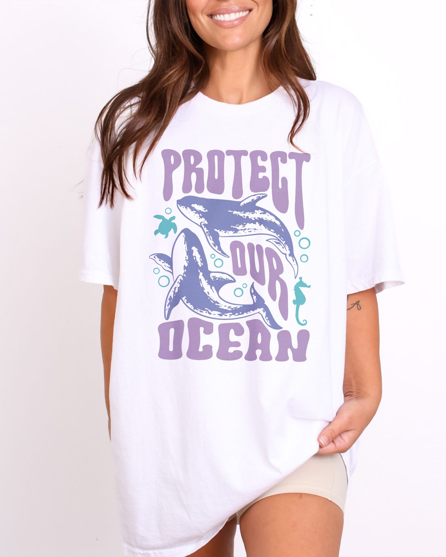 Model wearing white color shirt with 'Protect Our Ocean' retro graphic design