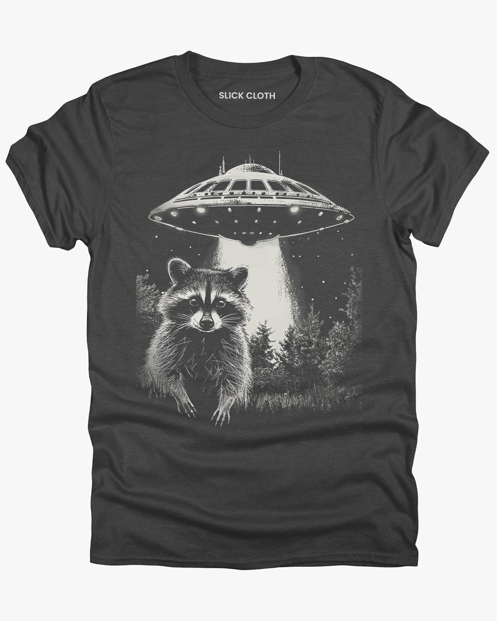 Flat lay dark heather 'Raccoon UFO' t-shirt featuring a funny graphic of a raccoon escaping a UFO abduction.