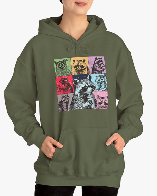 Woman wearing a military green hoodie with a retro and funny raccoon lifestyle collage graphic.