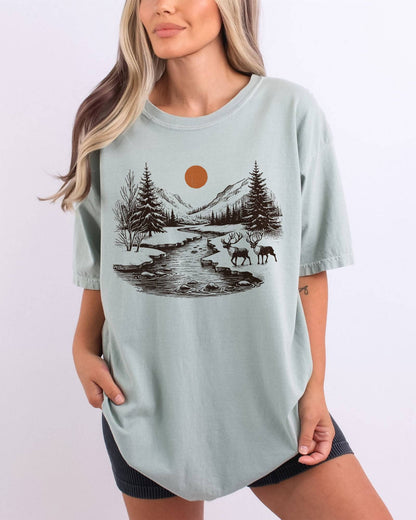 Model wearing bay color shirt with reindeer nature retro graphic design