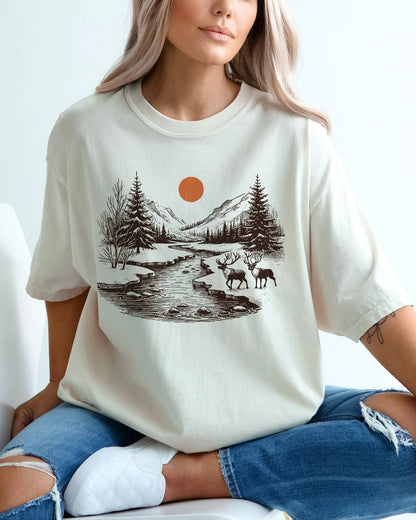 Model wearing ivory color shirt with reindeer nature retro graphic design