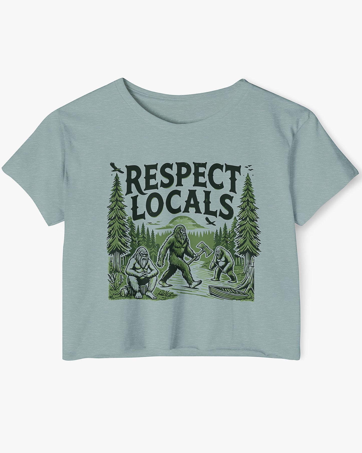 Flat-lay stonewash green 'Respect Locals' crop top featuring a funny retro Bigfoot walking through the forest graphic.