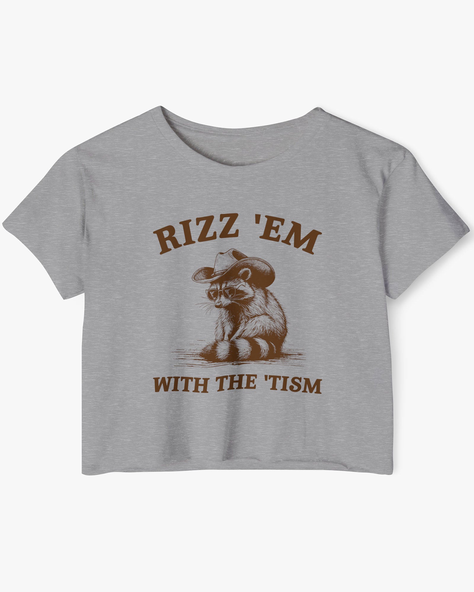 Flat lay heather gray 'Rizz Em With The Tism' crop top featuring a funny retro cowboy raccoon graphic.
