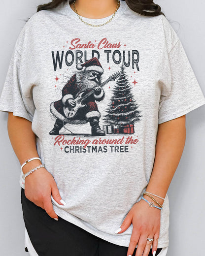 Woman wearing retro graphic Santa Claus World Tour Shirt in ash grey color