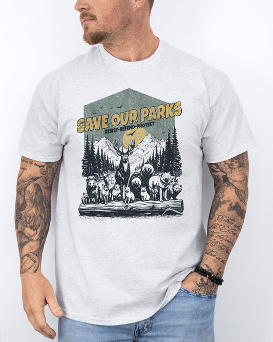Model wearing ash color shirt with 'Save Our Parks' graphic design