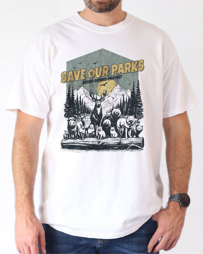 Model wearing white color shirt with 'Save Our Parks' graphic design