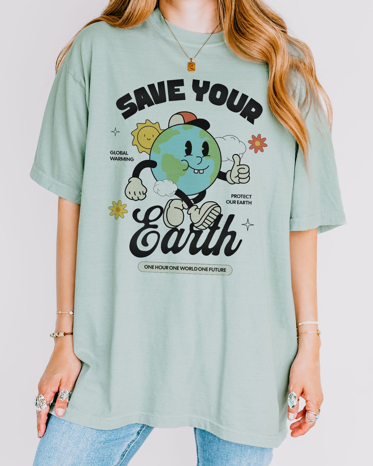 Woman wearing Save Your Earth shirt in bay color with retro globe earth day graphic