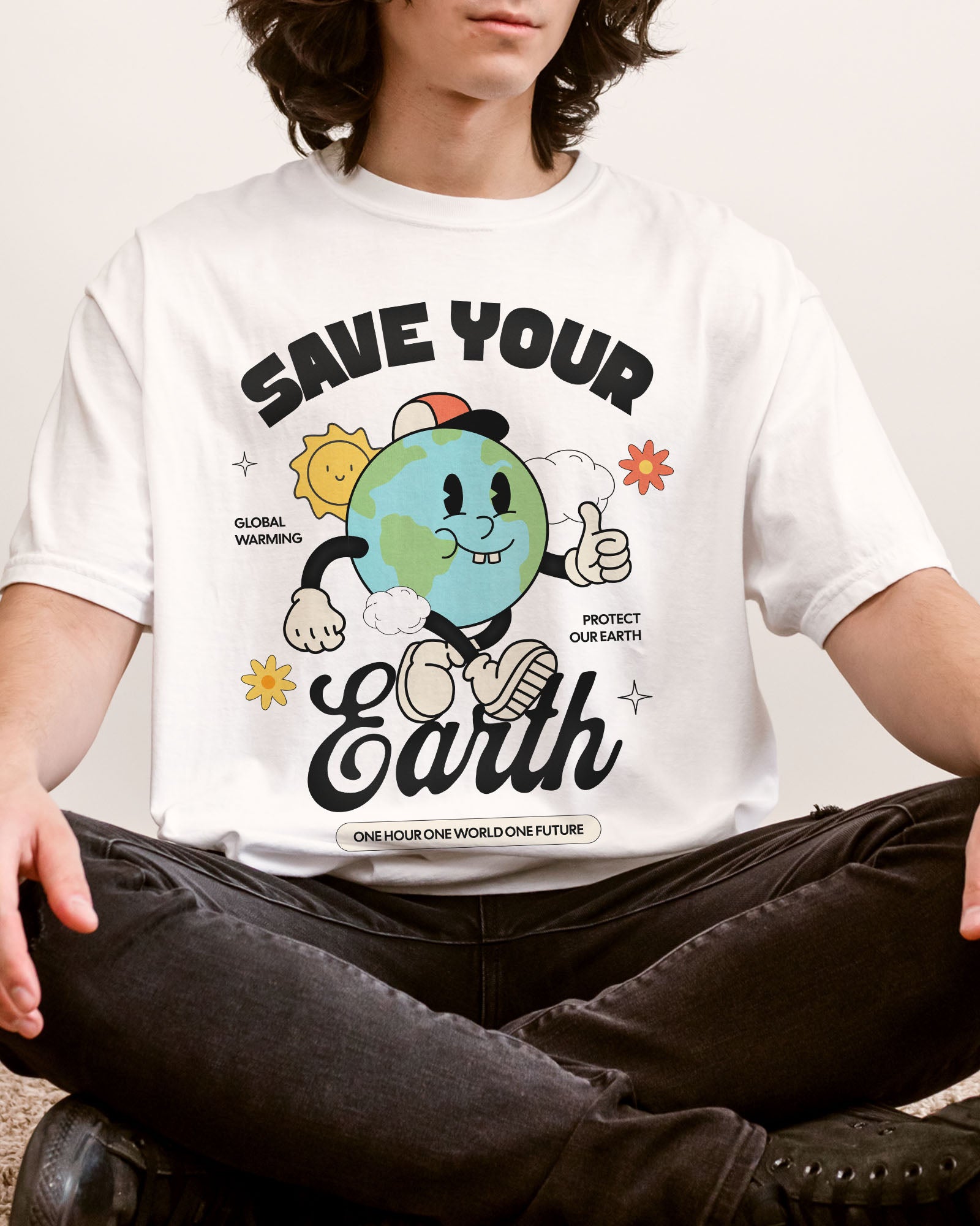 Man wearing Save Your Earth shirt in white color with retro globe earth day graphic