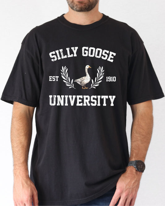 Model wearing black color sweatshirt with Silly Goose University graphic design