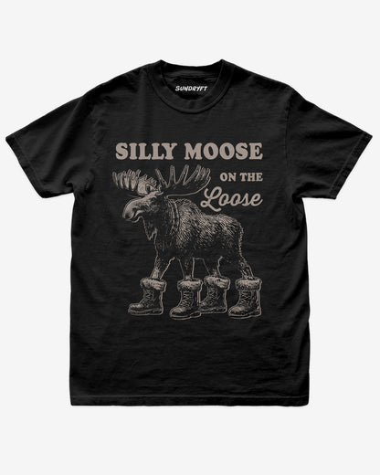 Black “Silly Moose On The Loose” funny Christmas winter holiday shirt flat lay.