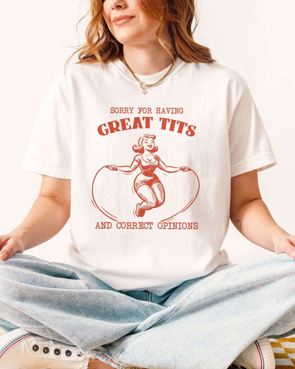 Woman wearing funny white t-shirt with quote "Sorry For Having Great Tits And Correct Opinions" and an outline graphic of a curvy woman jumping rope.