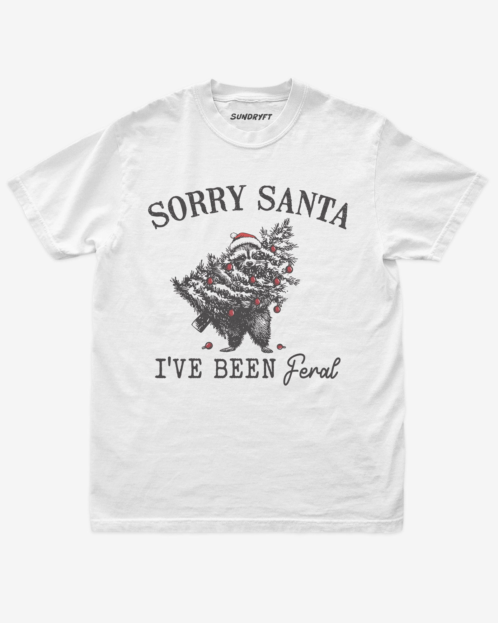 Sorry Santa I've Been Feral shirt in white with raccoon eating Christmas tree graphic