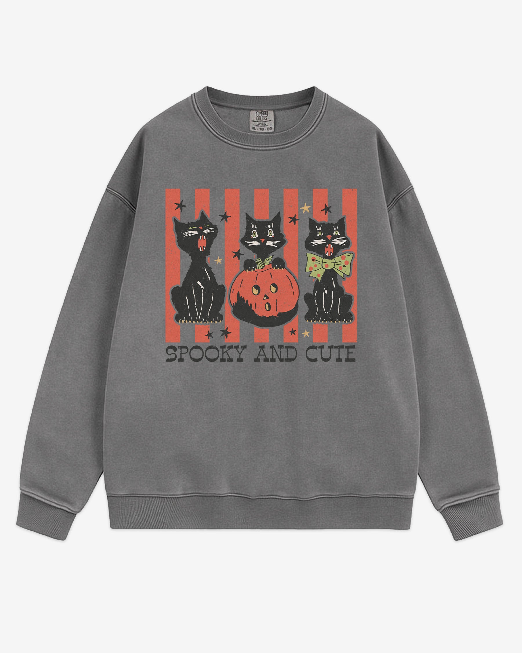 Flat lay gray-colored 'Spooky And Cute' sweatshirt with retro Halloween graphic of three black cats and a pumpkin.
